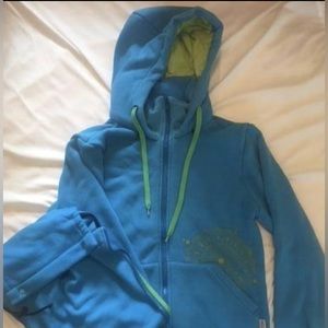 Baby wearing hoodie and wraps